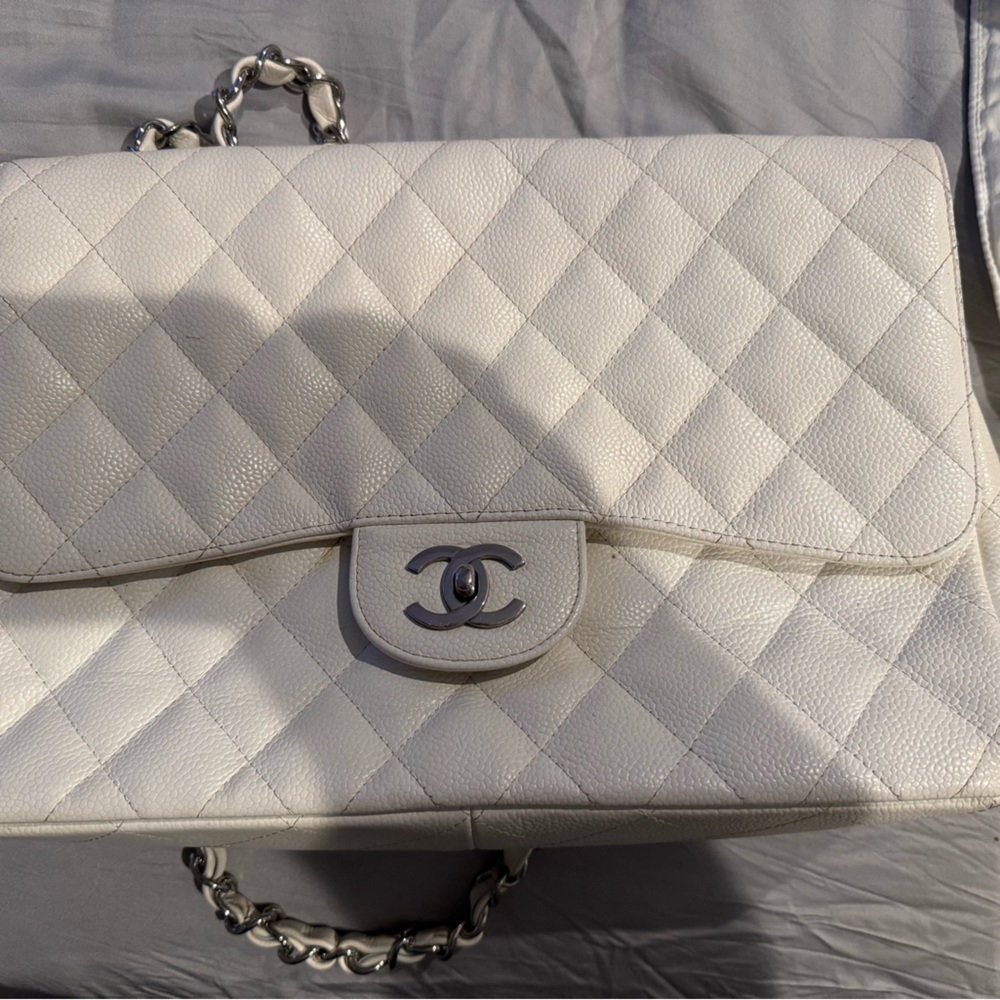 White/cream Chanel flap front handbag